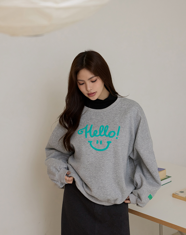 PLAYFUL SMILE FLOCKED SWEATSHIRT