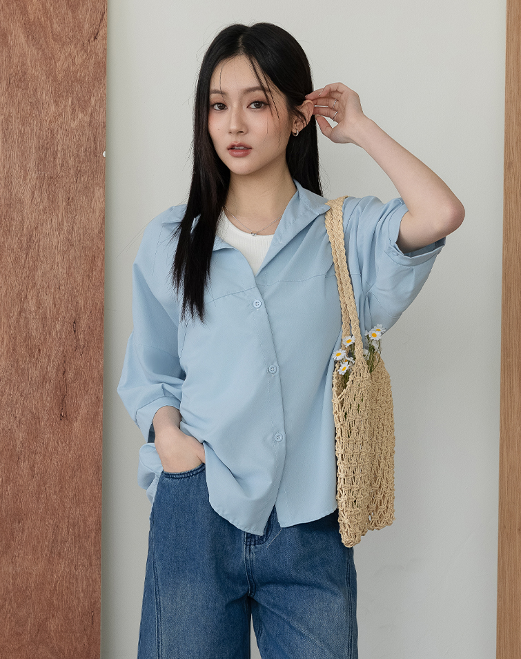 LONGLINE CURVED CUT PUFF SLEEVE BLOUSE
