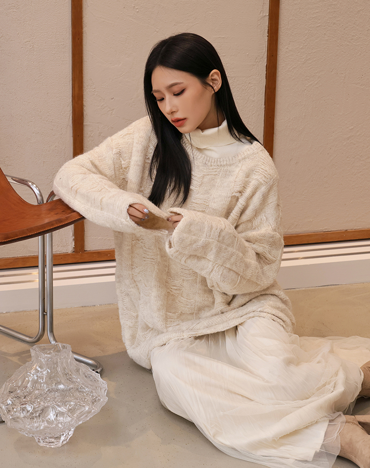 TEXTURED PATCHWORK SWEATER