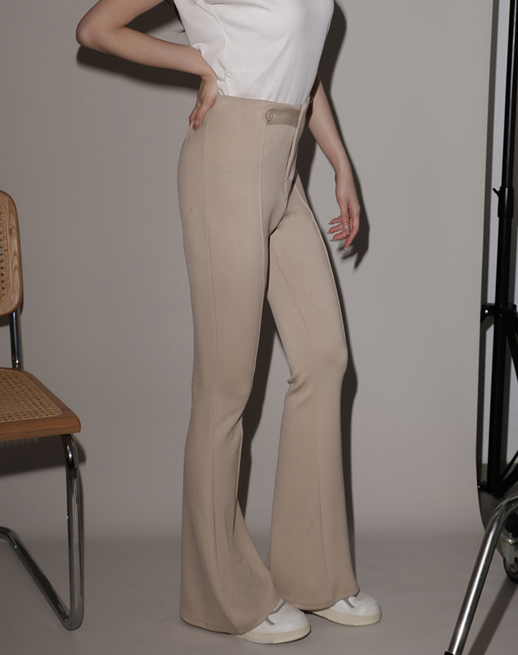 UNDERSTATED SLIM-FIT TROUSERS