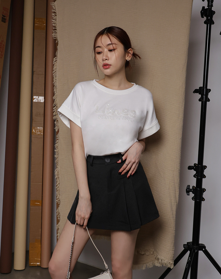 STRUCTURED ELEGANT PLEATED MINI SKIRT